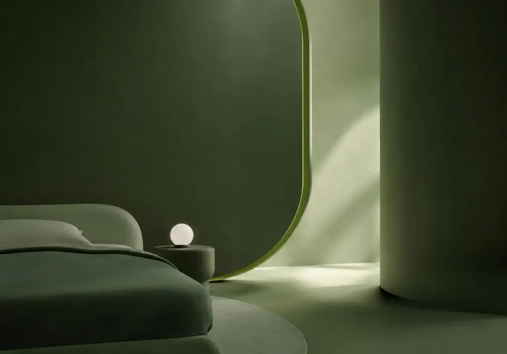 A quiet bedroom corner with soft morning light spilling through a curved opening