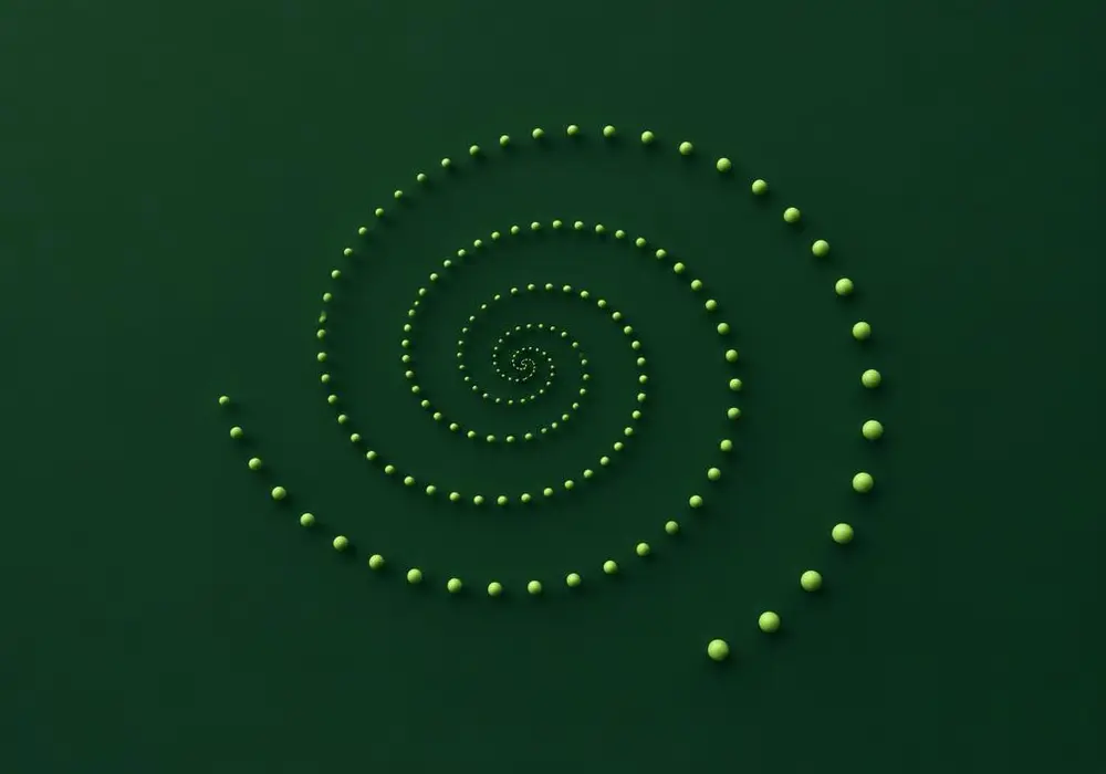 A spiral of small green dots tightening toward a calm centre