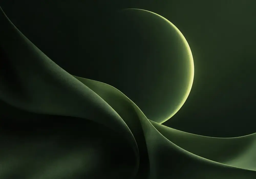 Softly folded shapes around a dim evening crescent