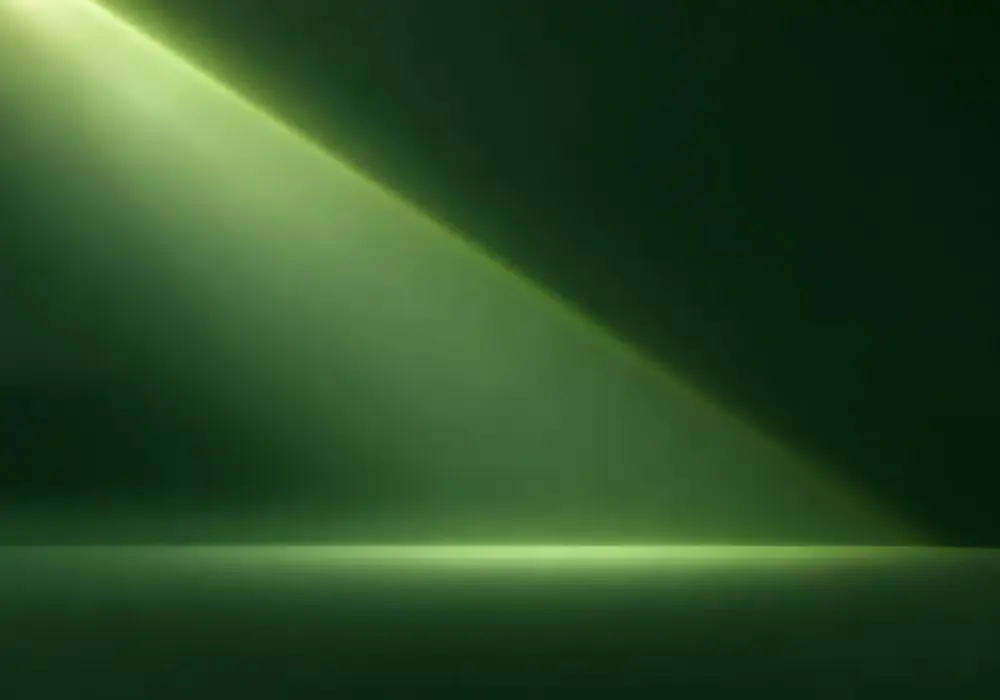 A soft diagonal shaft of light across an empty surface